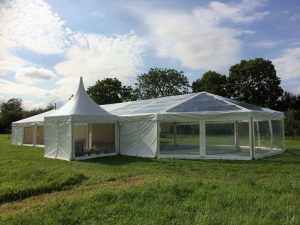 Clear gable and roof to one end of marquee with oriental canopy attached