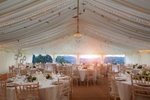 Clearspan marquee with pea lights and bird decorations.... with an amazing view!!