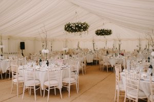 Ivory themed wedding with beautiful hanging flower rings